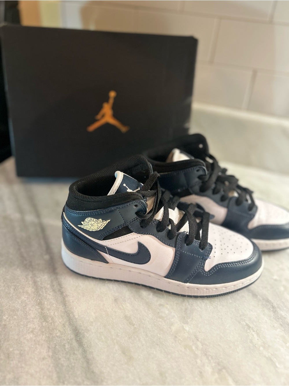 Jordan Kids Mid-Top Sneakers in Black and White